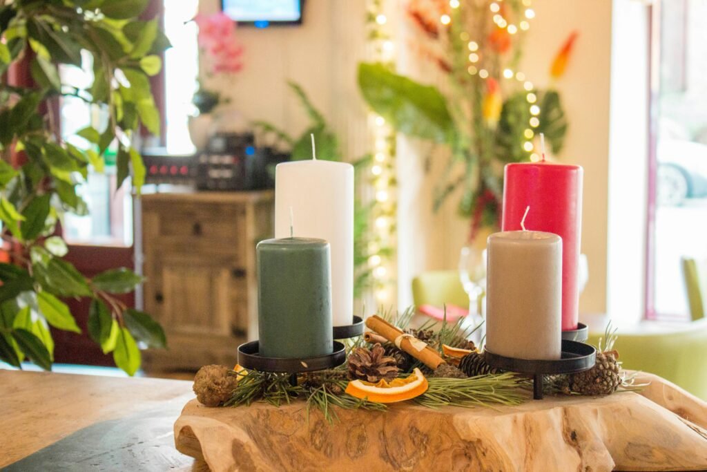 pillar candles on brown wooden table