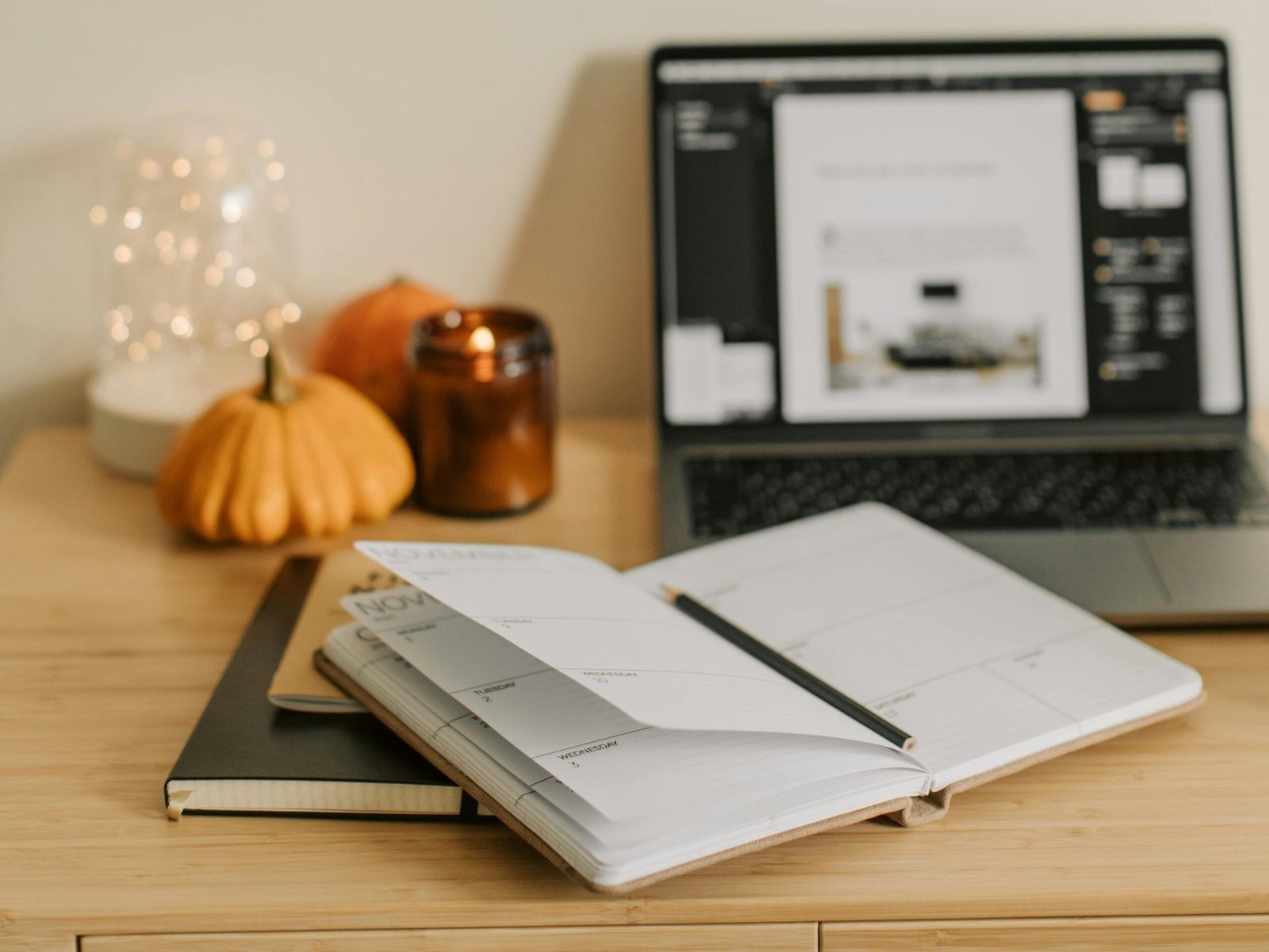 notebook beside a laptop