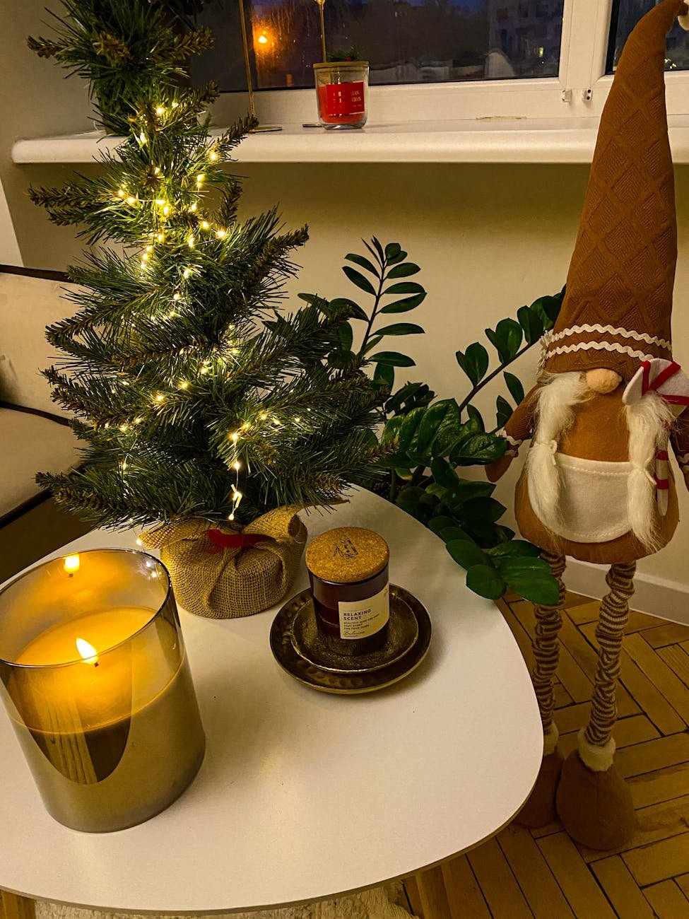 cozy christmas corner with decor and candlelight
